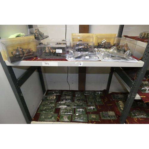 4129 - A collection of boxed miniature model military vehicles (two shelves)