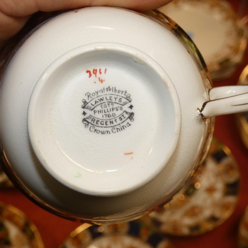 4239 - A part multi-coloured floral patterned Carlisle ware tea set
