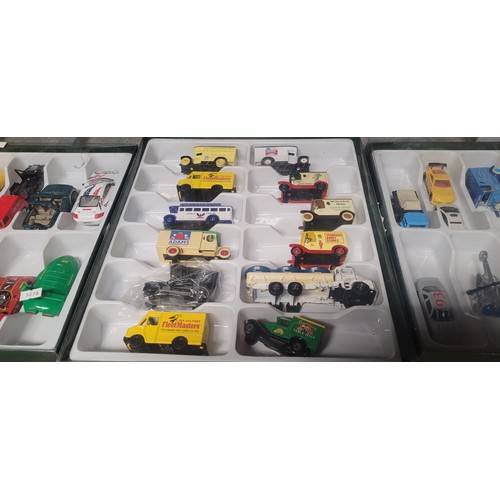 3129 - 3 remote control cars, 38 small model vehicles and 4 boxes of CD holders. Contents of 1 shelf