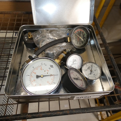 5020 - 1 tin box containing a quantity of various pressure gauges