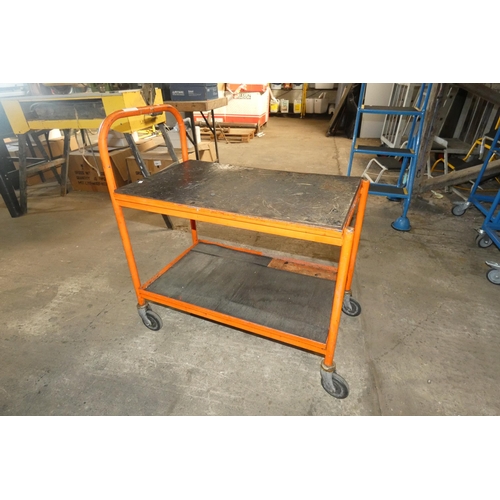 5072 - A red metal two tier trolley