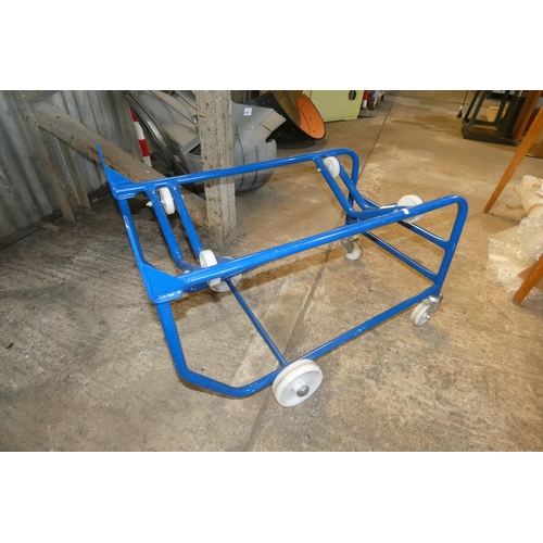 5073 - A blue metal wheeled frame for 45 gallon drums (no handle is included)