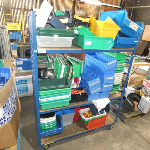 5131 - A quantity of various type plastic storage bins. Please note that the wheeled shelf unit these bins ... 