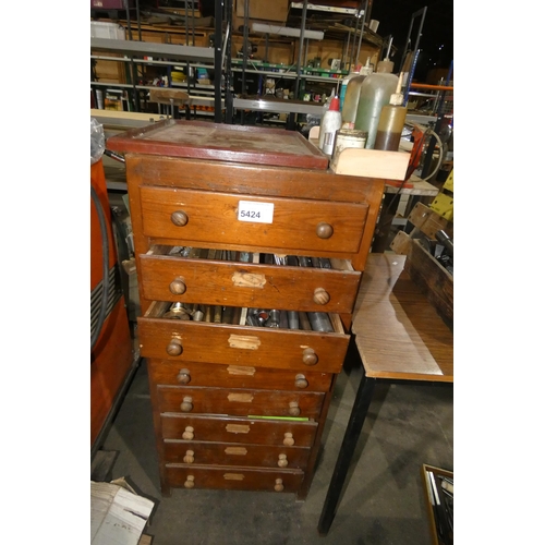 5424 - A wooden 8 drawer cabinet containing a quantity of various engineering items including various size ... 