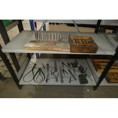 5482 - A quantity of various engineering related items including a set of wad punches, callipers etc. Conte... 