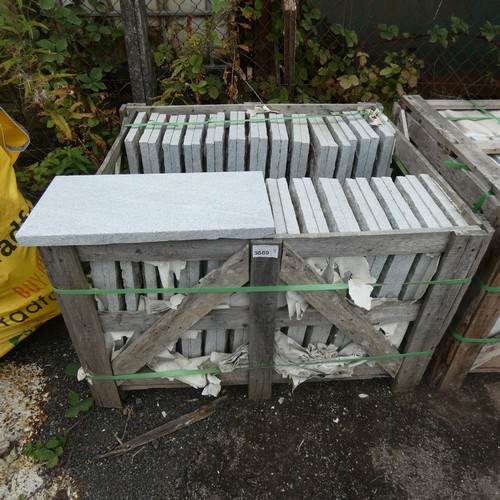 5589 - 1 crate containing approx 52 slabs of Granite each approx 600 x 300mm