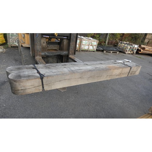 5606 - A pair of gate posts with rounded tops, measuring approx 18cm x 18cm x 2.1m (top stack)