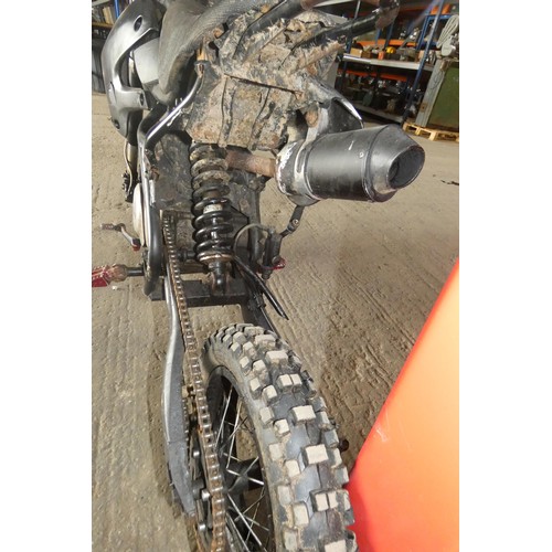 5915 - A pit motorbike by Stomp 140cc - Starts and runs but engine pressurises the crank case and blows all... 