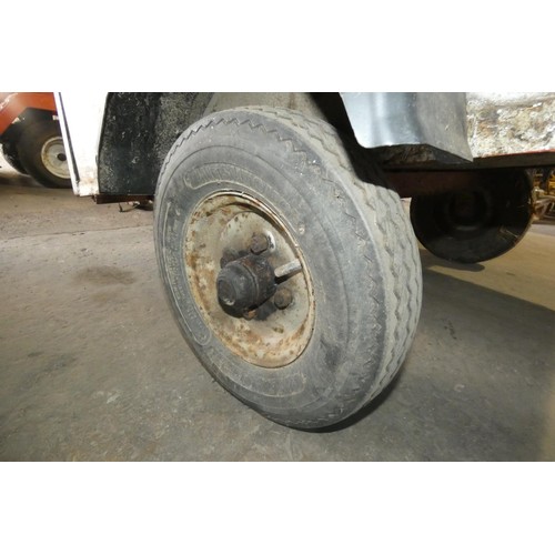 5934 - 1 single axle un-braked trailer with no make visible, body size approx 92cm w x 157cm l and sides ar... 