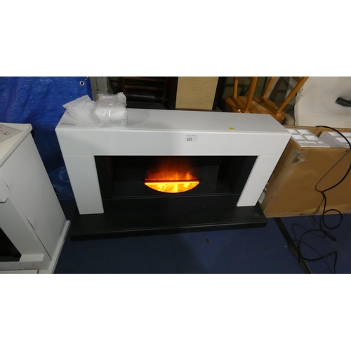 223 - 1 Adam white electric fire suite, approx 116cm w x 66cm h RRP £337. No remote control is included