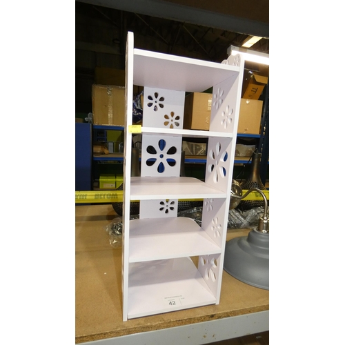 42 - A small white shelf unit