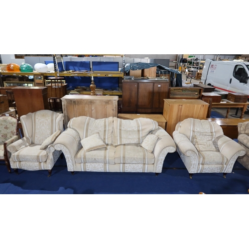 2177 - A fawn upholstered 3 seater settee with a matching armchair and matching wing chair