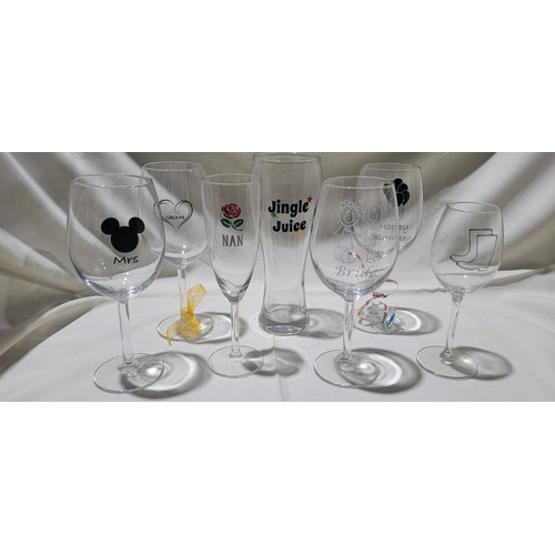 2216 - A quantity of Birthday/wedding day/special occasion gift/novelty wine glasses. Contents of 1 shelf