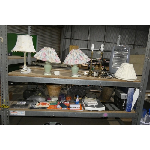 2099 - A quantity of various items including table lamps, a heater 240v, bathroom scales, etc. Contents of ... 