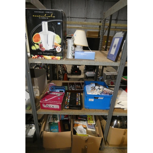 2104 - A quantity of various household items including a Rosemary Conley juicer 240v, cutlery, DVDs, books ... 