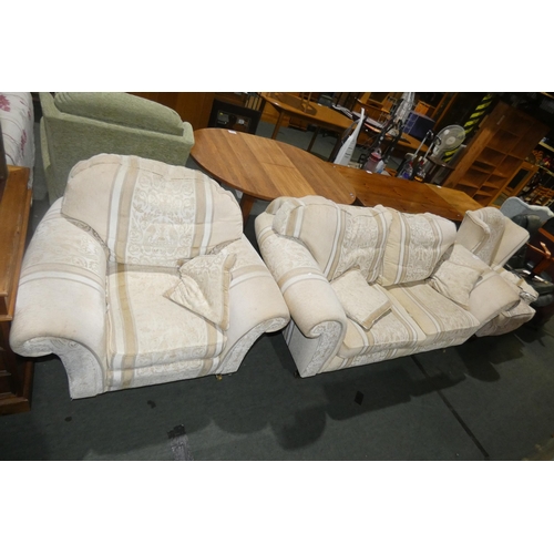 2177 - A fawn upholstered 3 seater settee with a matching armchair and matching wing chair