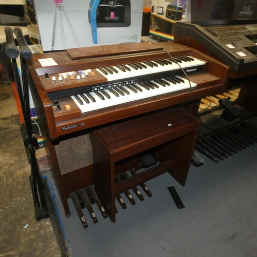 2301 - A wood effect freestanding twin keyboard electric organ by Technics type SX-1800B , comes with match... 