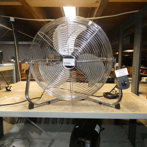 2390 - A large chrome effect electric fan - trade