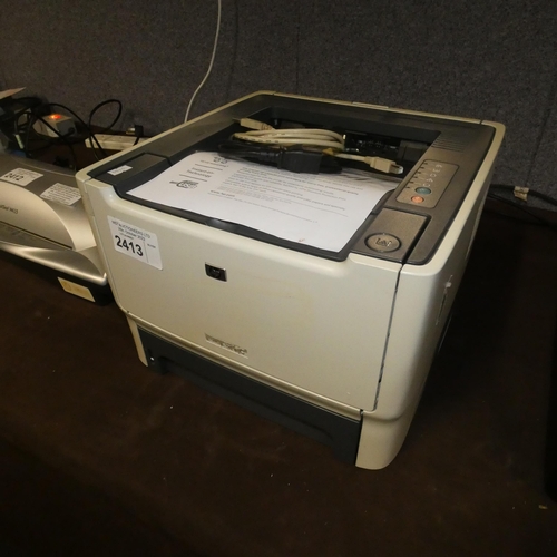 2413 - An office printer by HP type p2015 working - trade