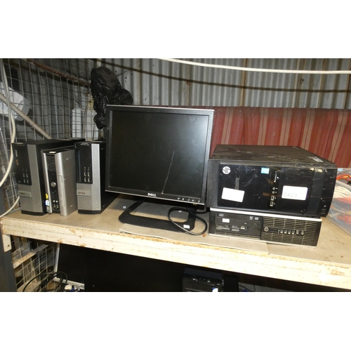 2423 - A quantity of various IT related items including monitors, towers no HDDs, cables etc. Contents of 1... 