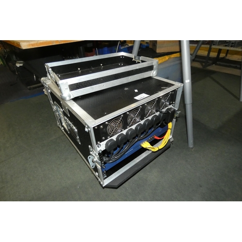 2451 - A mobile network switch (Netgear prosafe 16 port)/cooled power supply unit in a flight case.