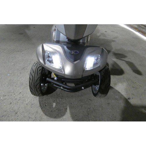 2097 - A battery powered mobility scooter by Kymco type Foru Agility metallic mink, cost around £2,500 when... 