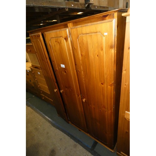 2120 - A pine triple door wardrobe approx 128 x 55 x 178cm high