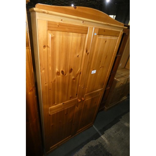 2121 - A pine double door wardrobe approx 97 x 53 x 183cm high