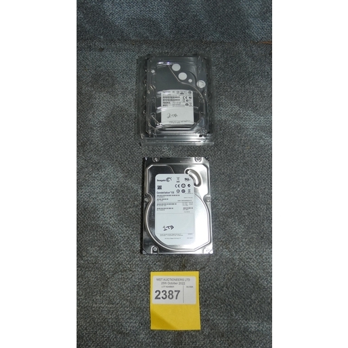 2387 - A 3.5 inch 2tb SAS hard drive & a 1tb SATA hard disc drive