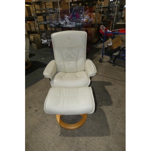 2231 - 1 Stressless cream upholstered swivelling reclining arm chair with matching footstool.
Height 95cm  ... 