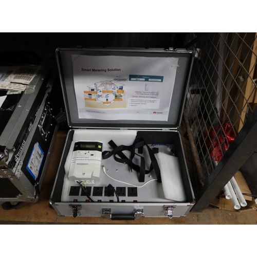 2329 - A metal mobile flight case 53x36x20cm, contains a mobile smart meter. Trade