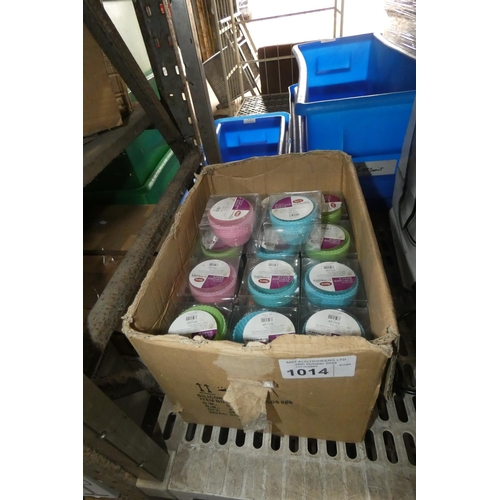 1014 - A box containing a large quantity of unused reusable silicon cupcake bases/cases/cups in original pa... 