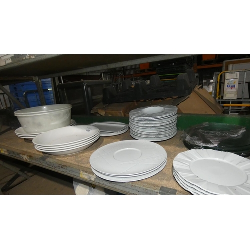 1032 - A quantity of various catering related items including plates, bowls, serving platters etc. Contents... 