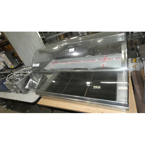 1062 - A commercial stainless steel integrated (drop in counter top) serve over, glass front, heat plate un... 