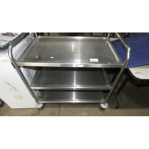 1067 - A commercial stainless steel mobile 3 tier trolley