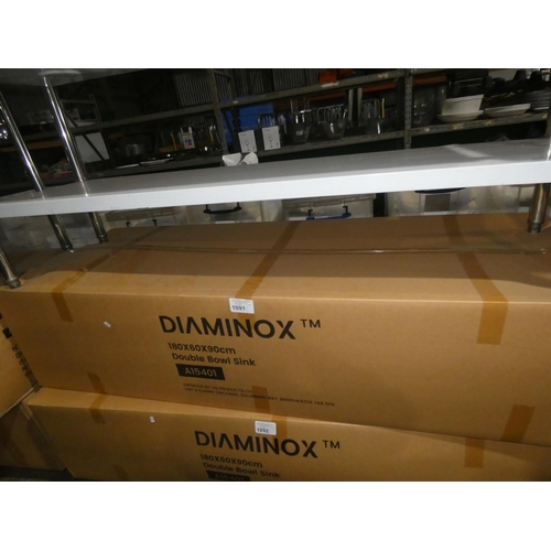 1091 - A stainless steel double bowl sink unit with draining board to the right by Diaminox type A15401 app... 