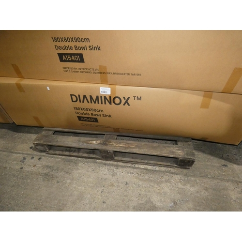 1092 - A stainless steel double bowl sink unit with draining board to the right by Diaminox type A15401 app... 