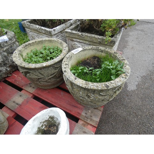 2584 - 2 X round weathered concrete planters