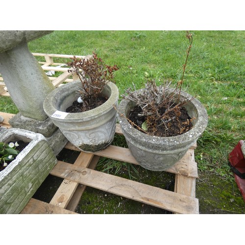 2588 - 2 X decorative round weathered concrete planters