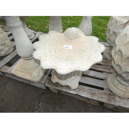 2601 - A 2 piece shell shaped concrete bird bath