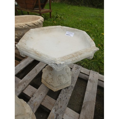 2603 - A low hexagonal concrete bird bath