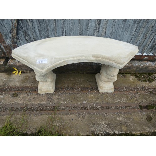 2614 - A curved concrete bench on squirrel plynths