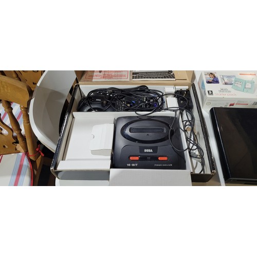 2435 - A Sega Mega Drive II console boxed with 2 controllers, a Nintendo DS lite handheld console boxed wit... 