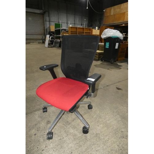 1238 - 1 office swivel chair by Techo with red seat and a black mesh back