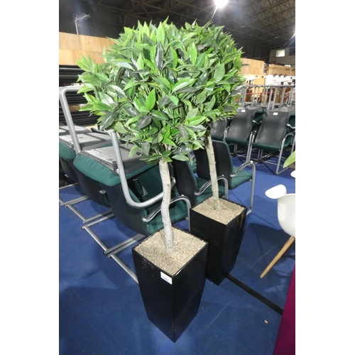 1280 - 2 black square planters each containing an artificial plant and each approx 56cm high