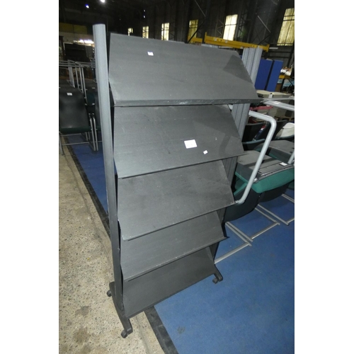 1281 - 1 wheeled black plastic magazine / literature display rack approx 80cm w x 166cm high