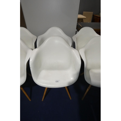 1290 - 2 x white plastic designer style chairs with wood / black metal legs