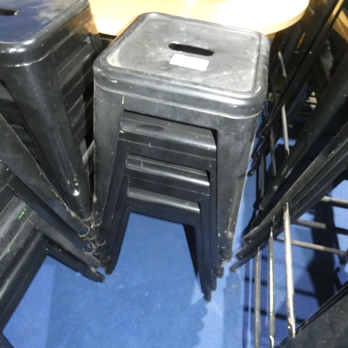 1323 - 4 black metal stacking stools each approx 45cm high