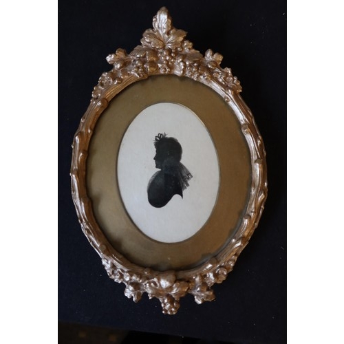 3007 - English School 20th Century, Silhouette of a young woman head and shoulder, oval, gilt Rococo style ... 