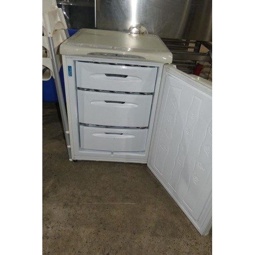 1142 - An under counter freezer by Hotpoint type Future RZA34 - trade. TESTED WORKING